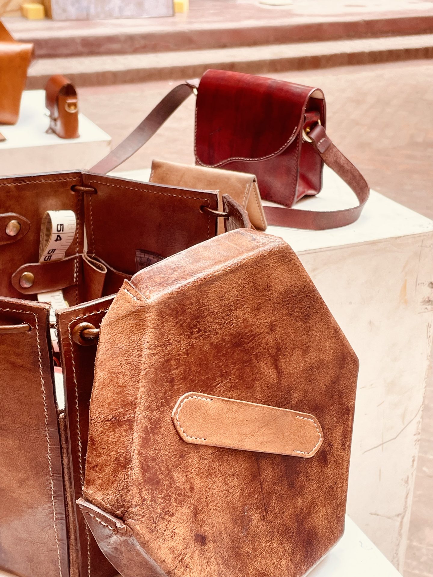 Open lid of bucket bag showing six interior pockets