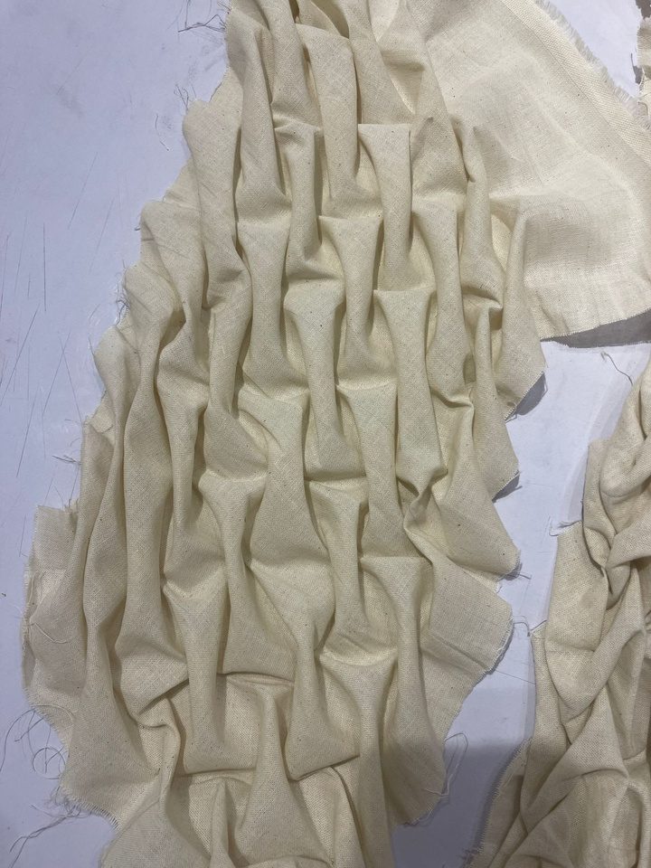 Vertical pinched smocking sample in undyed cotton