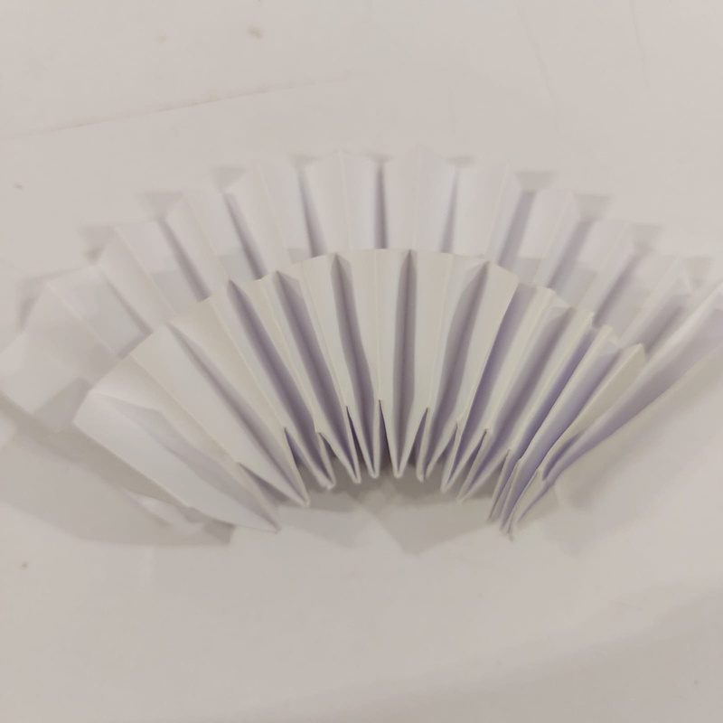 Radial paper fan, partially opened