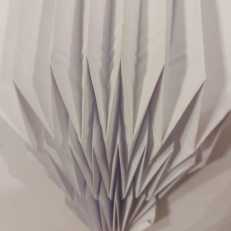 Vertical pleated paper fan detail