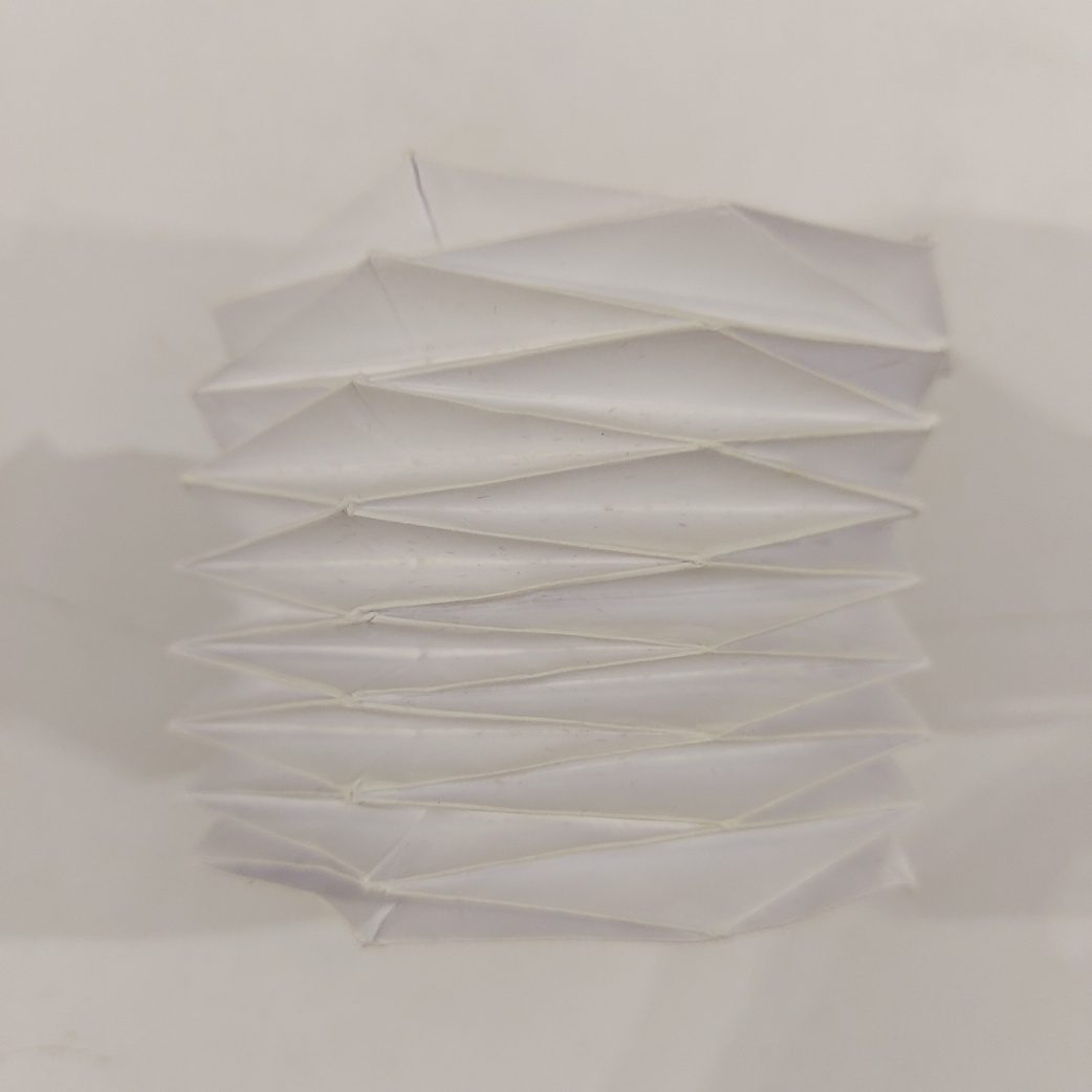 Flat tessellated diamond grid fold
