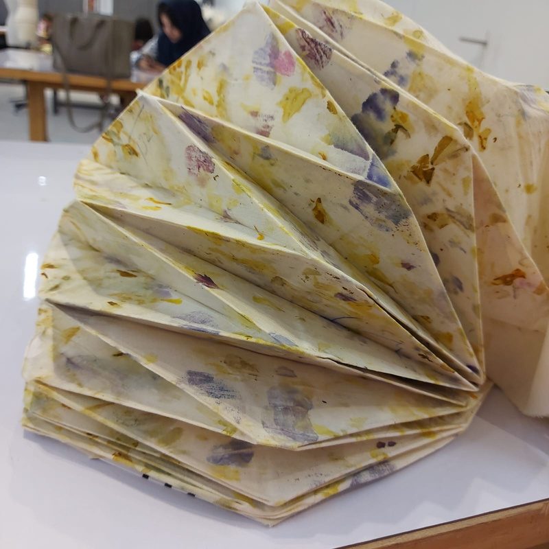 Eco-printed folded fabric form on the studio table