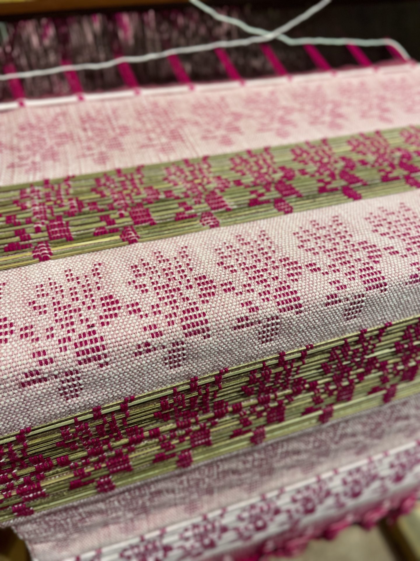 Pink and cream jacquard woven fabric detail