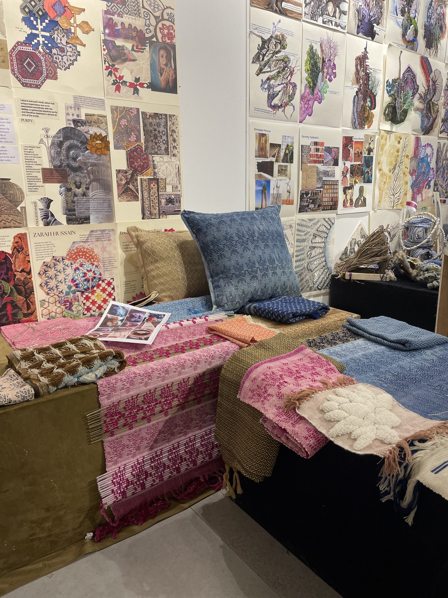 Display of fabric samples and cushions in the studio